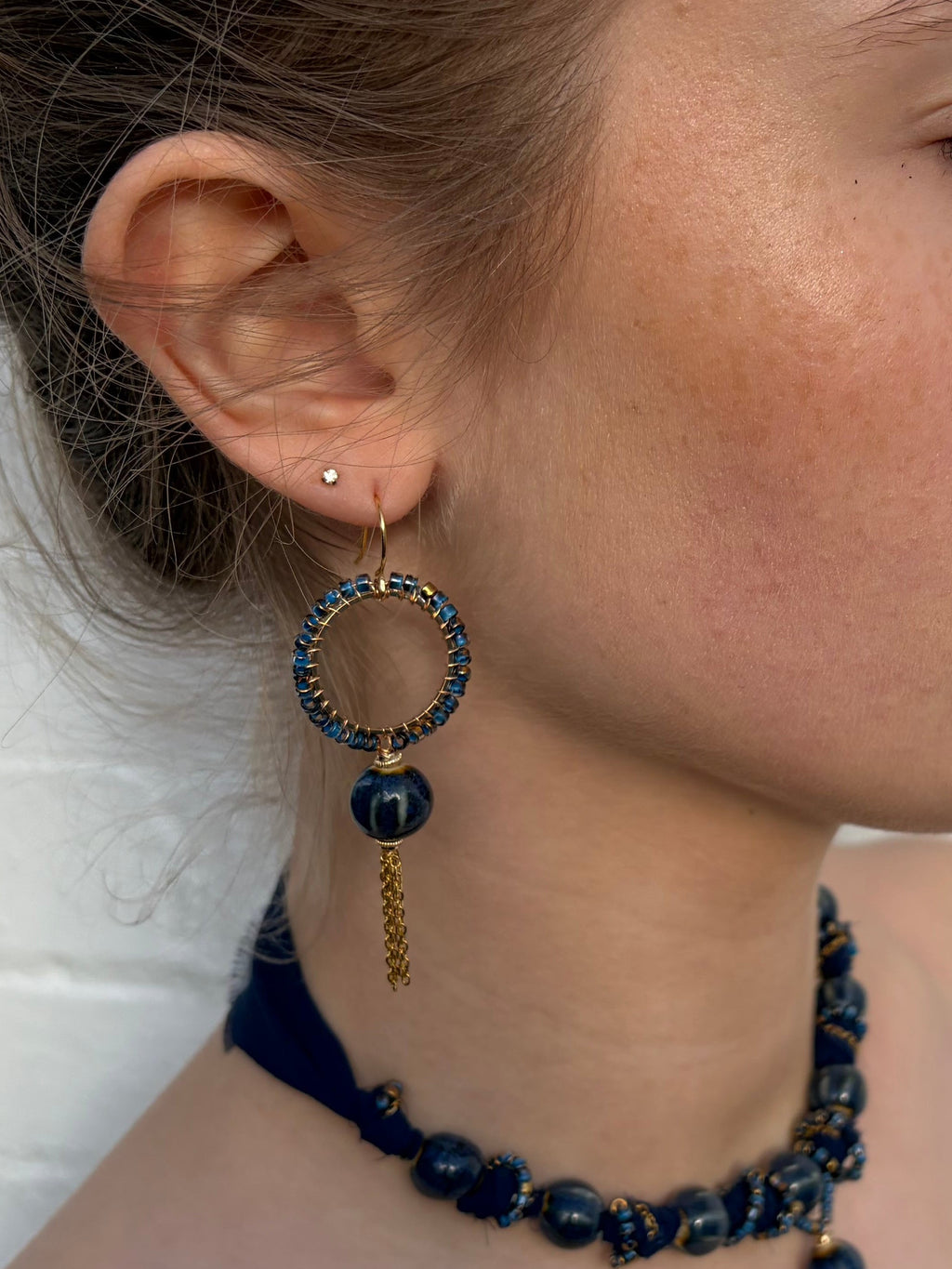 Stone blue Luna ceramic bead tassel earrings
